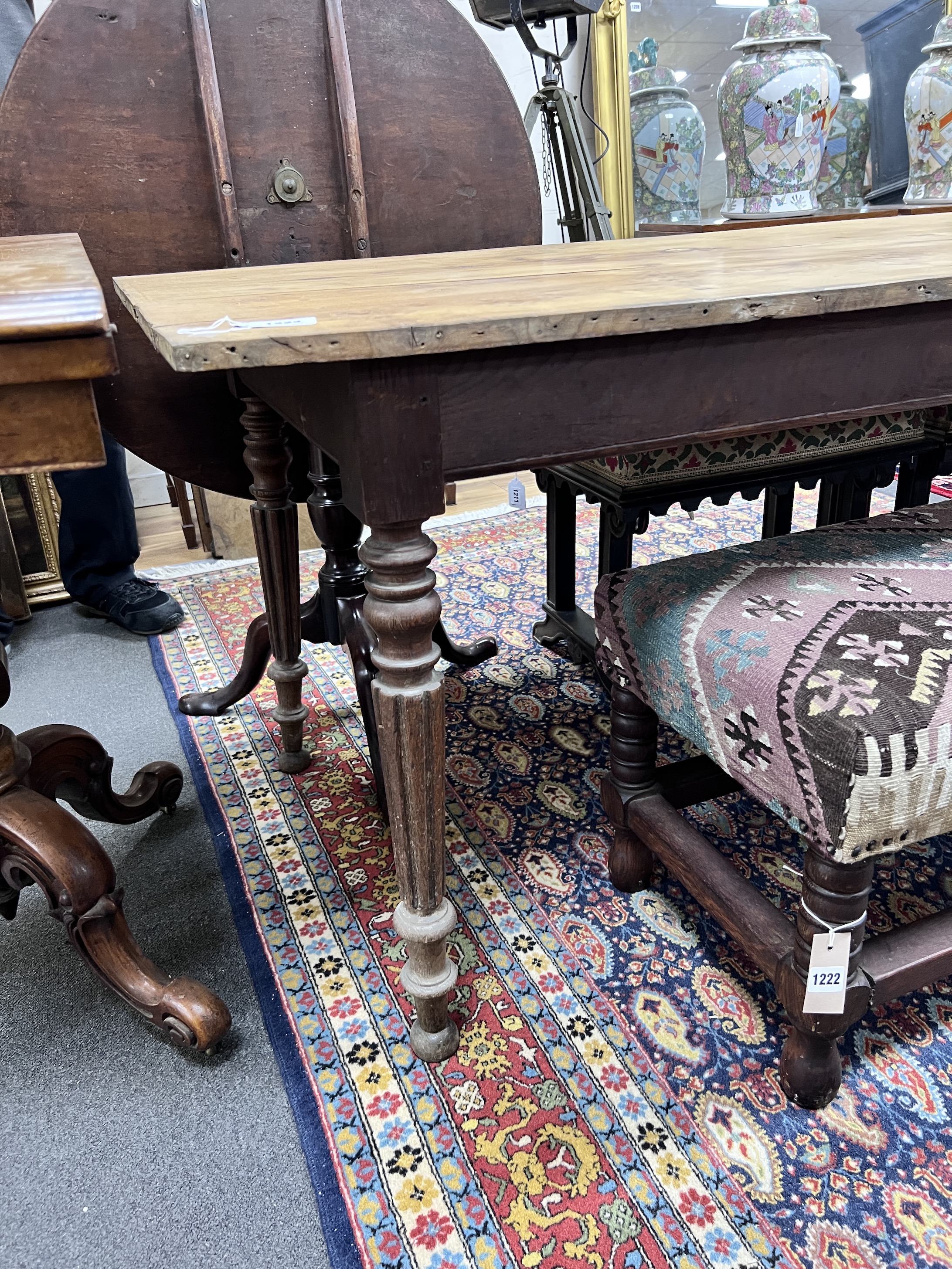 A 19th century French oak and fruitwood kitchen table, length 194cm, width 74.5cm